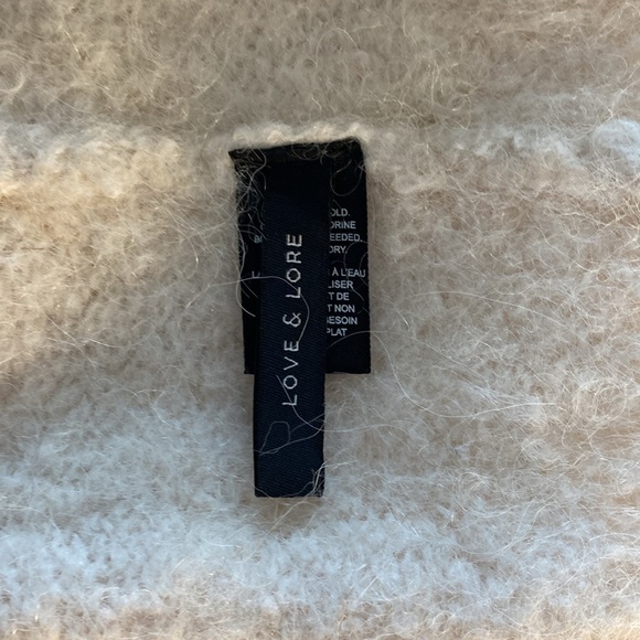 White fuzzy beanie. - Picture 2 of 2